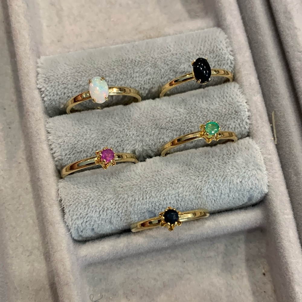 Gold plated rings with stones